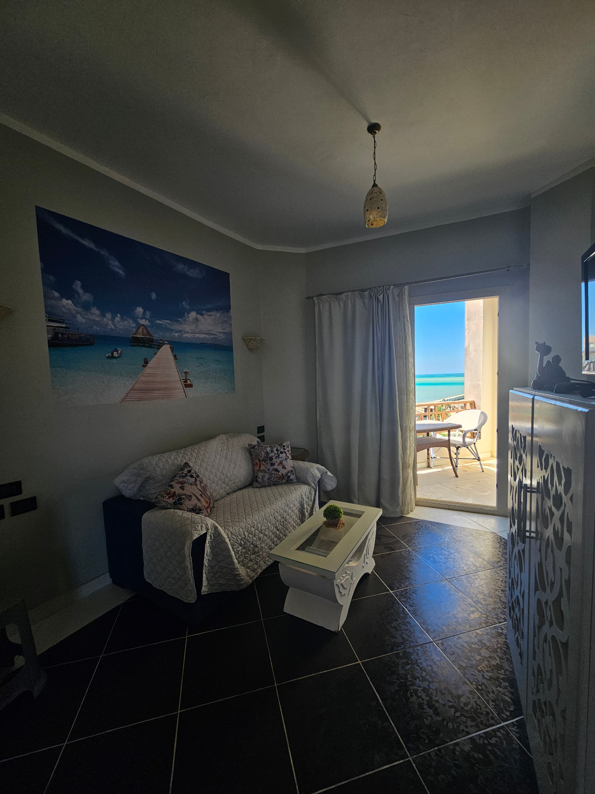 Living area and sea-view balcony